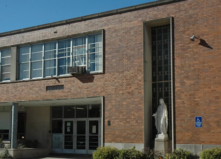 October 24, 2007. While the Chicago Board of Education has tried to replace as many public schools as possible with charter schools, often basing criticisms of the public schools on the slightest problem, the Board has allowed the Chicago International Charter School (CICS) to perpetuate the myth that a school can be a “campus” of a school. CPS has also ignored the blatant use of Roman Catholic religious icons as part of the appeal the charters make to prospective students and their families. The newest Chicago International Charter School “campus” (above) is called the “CICS Irving Park” charter school and is housed in the former Immaculate Heart of Mary elementary school building on Chicago’s northwest side. Staff of the Office of New Schools covertly provided CICS Irving Park with the names of the top scoring children at nearby Reilly, Murphy, and Belding elementary schools last summer. CICS then launched a campaign that included misrepresentation about the three nearby public elementary schools. Chicago’s public schools Board of Education has allowed CICS “campuses” to retain religious symbols both on the outside and inside its building, as above at the “Irving Park” CICS, photographed last month. Substance photo by George N. Schmidt.